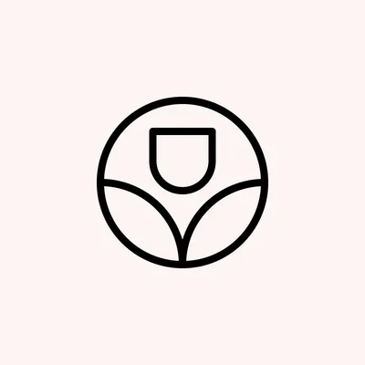 Minimalist black and white logo of a plant in a pot, designed within a circular frame.